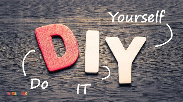 Wooden letters DIY on rustic wood background with words Do It Yourself, craft and creativity concept