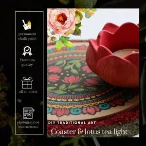 Red lotus-shaped tea light candle holder on colorful floral mandala coaster with decorative flowers